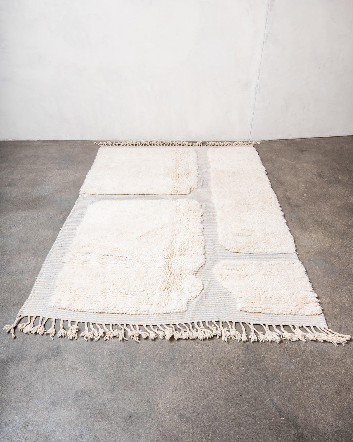 Modern, designer, handcrafted Berber rug from Morocco. Beniourain carpet with beautiful colours and patterns and fluffy wool texture.